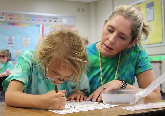 Teacher With Student