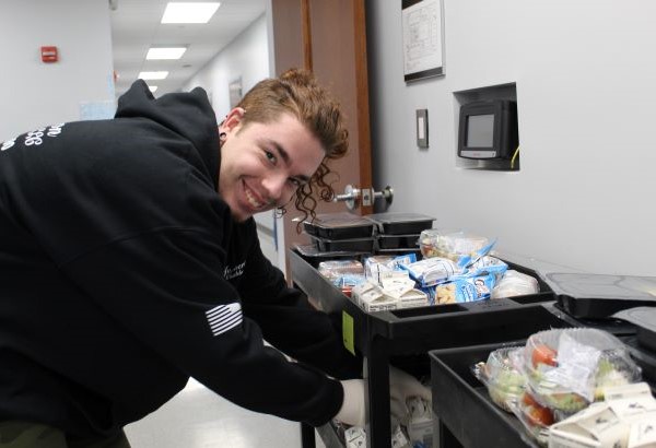 Student working in the school kitchen